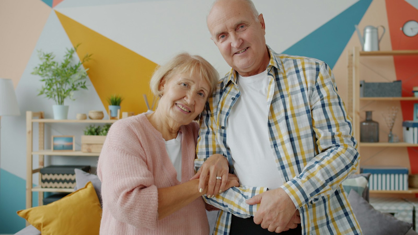 Couple smiling together at home
